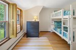 Twin bunk beds in the third upstairs bedroom are perfect for the kids